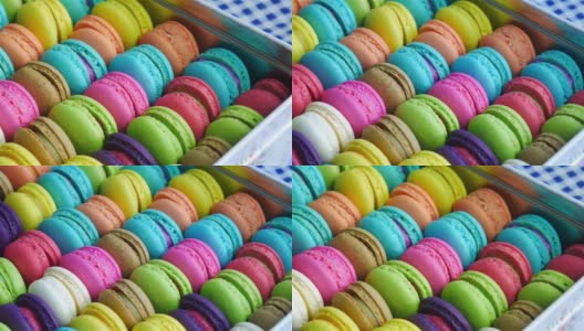 法式马卡龙甜点在盒子里。一排排五颜六色的法国马卡龙。高清在线视频素材下载