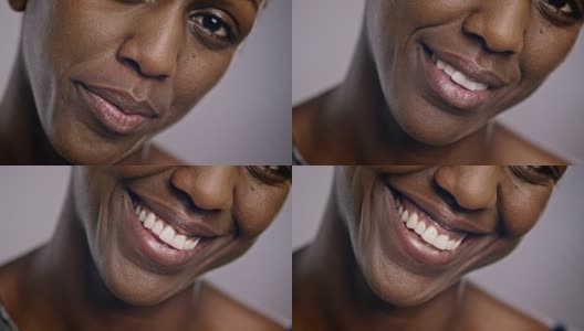 一个微笑的非裔美国妇女的嘴唇高清在线视频素材下载
