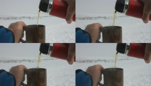 滑雪道上的热茶和大咖啡杯高清在线视频素材下载