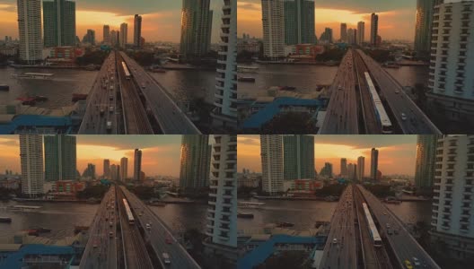 日落时桥上交通的鸟瞰图高清在线视频素材下载