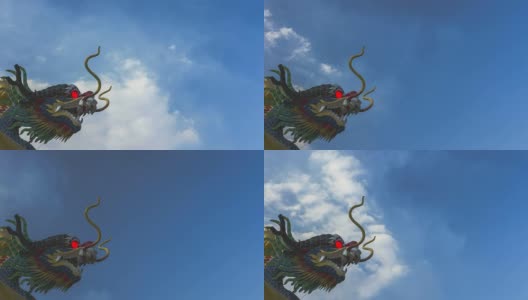 时间流逝:中国龙雕塑与移动的云背景高清在线视频素材下载