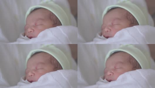 亚洲新生儿男孩在睡觉，新生儿在医院高清在线视频素材下载