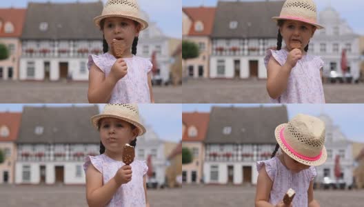 可爱的幼童在户外吃冰淇淋高清在线视频素材下载