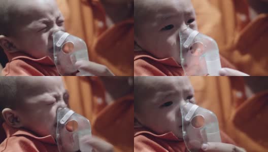 生病的孩子通过喷雾器呼吸高清在线视频素材下载