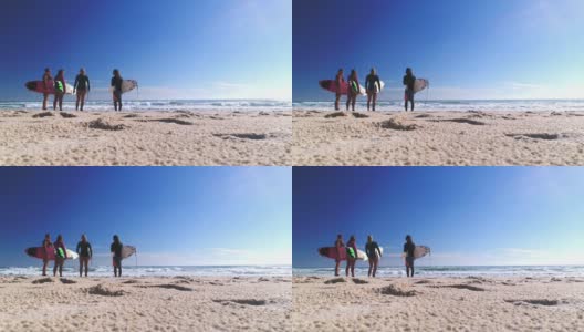 冲浪者站在海滩上准备冲浪高清在线视频素材下载