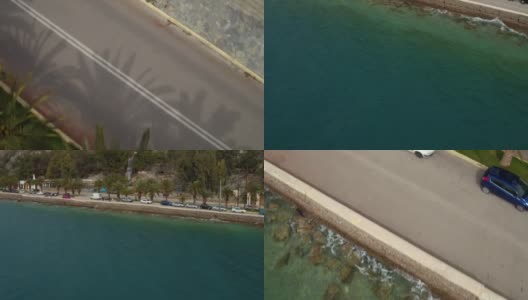 空中-劳特拉基-希腊，向后显示的海岸道路与棕榈树和瀑布高清在线视频素材下载