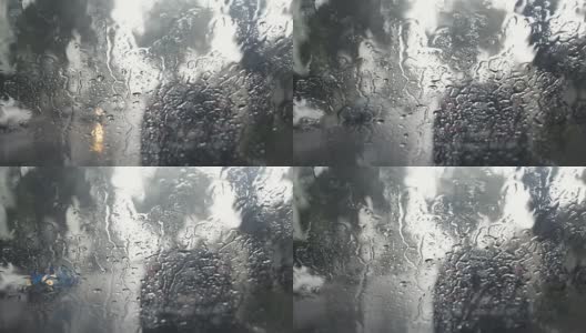 司机视角拍摄的一个雨点在挡风玻璃上II高清在线视频素材下载