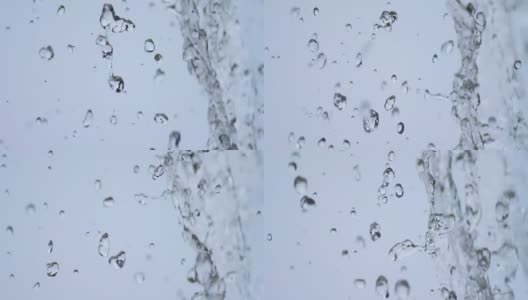 慢镜头:近距离观察，水滴从屋檐落下高清在线视频素材下载