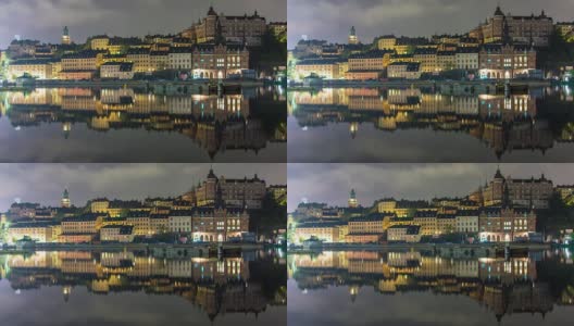 斯德哥尔摩城市建筑在夜间4K时间流逝。Sodermalm城市景观区，倒影在水中高清在线视频素材下载