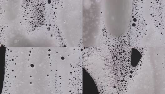 泡沫气泡抽象的黑色背景高清在线视频素材下载