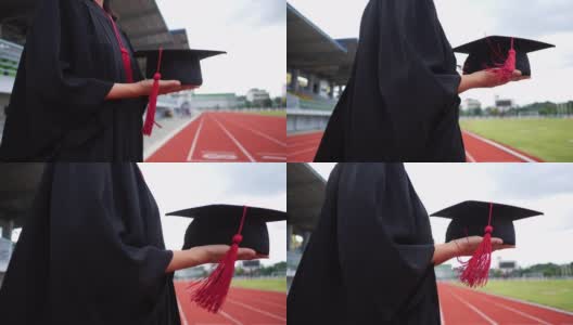 亚洲女学生拿着一顶大学毕业的帽子高清在线视频素材下载