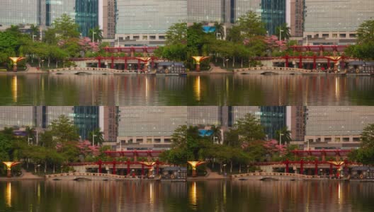 日落时间佛山市著名的湖边拥挤的公园市中心全景时间间隔4k中国高清在线视频素材下载
