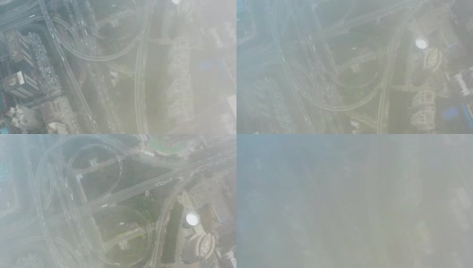 鸟瞰图的城市交通与云高清在线视频素材下载
