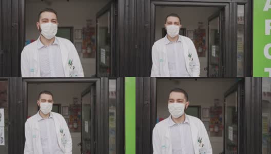 负责任的药剂师，戴着防护口罩，倚在药店门口高清在线视频素材下载