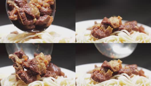 兰州牛肉面，辣椒油和牛肉，慢动作高清在线视频素材下载