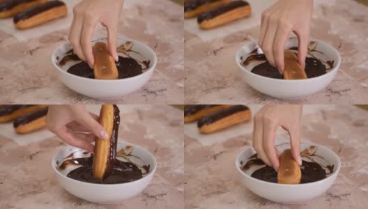 女人们用手蘸着巧克力泡芙。高清在线视频素材下载