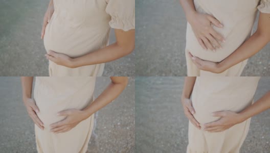 亚洲孕妇揉肚子高清在线视频素材下载