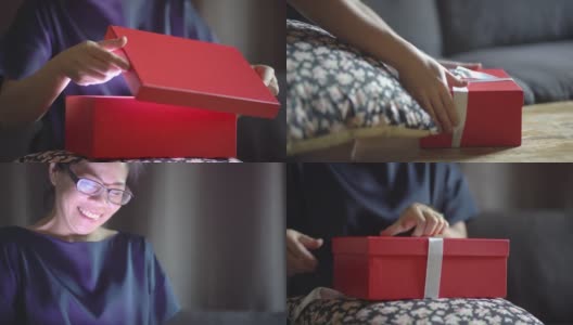 亚洲女人在家里打开礼品盒高清在线视频素材下载