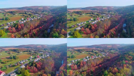 在宾夕法尼亚州波科诺斯小镇肯克尔敦的路上俯瞰，秋天的树叶。空中无人机视频。高清在线视频素材下载