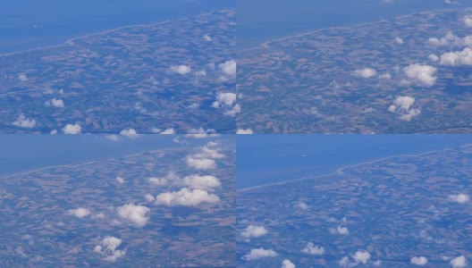 从飞机上鸟瞰农田、城市和海水景观高清在线视频素材下载