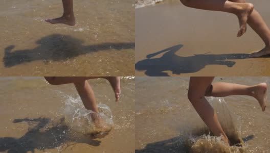 小女孩们赤脚在沙滩上跑步。缓慢的运动。高清在线视频素材下载