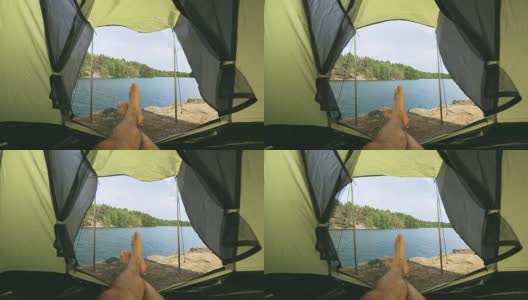 个人视角的一个人在一个帐篷在瑞典湖边高清在线视频素材下载
