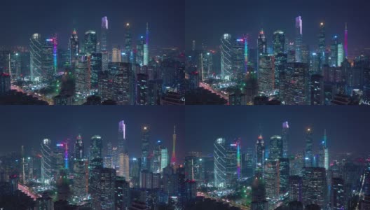 广州市内著名的现代夜景，照亮了4k中国市区航拍全景高清在线视频素材下载