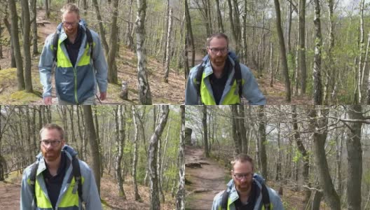 让徒步旅行者在森林小上山的小路上行走-脸的特写高清在线视频素材下载