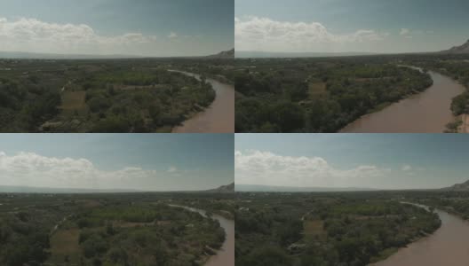 夏季无人机观察栅栏科罗拉多河流域农业绿地和水处理和BookCliff山脉高清在线视频素材下载