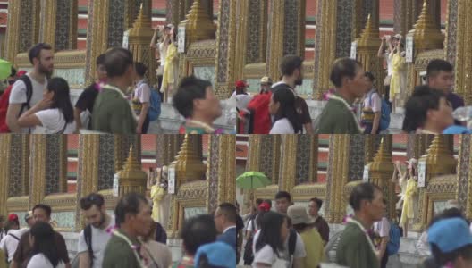 曼谷/泰国- 2018年5月23日:游客在Wat Phra Si Rattana Satsadaram拍摄慢镜头高清在线视频素材下载