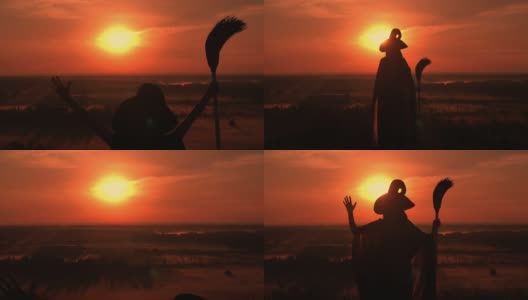 女巫站在日出的山景上高清在线视频素材下载