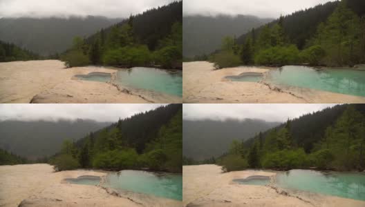 淘景:黄龙谷景观的五色池，在夏季水位，中国四川高清在线视频素材下载