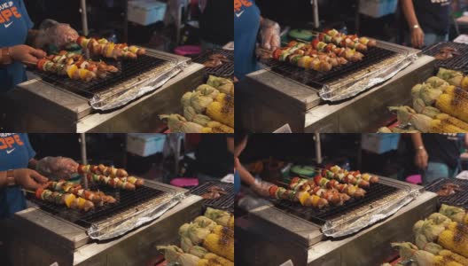 泰国地区的食物背景在晚上的街头食物高清在线视频素材下载
