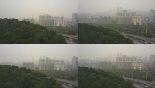 白天雾霾武汉市空中公园全景4k倾斜移位中国高清在线视频素材下载