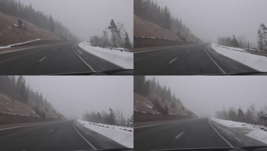 在科罗拉多州暴风雪中驾车穿过山口高清在线视频素材下载