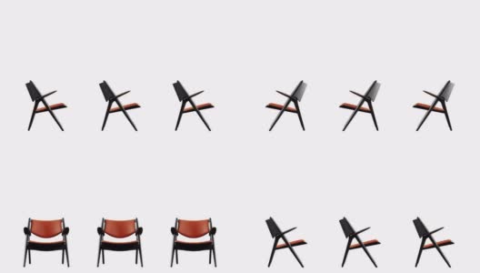 4k现代扶手椅橙色皮革和黑色木材。现代家具。旋转。循环。副本的空间。高清在线视频素材下载