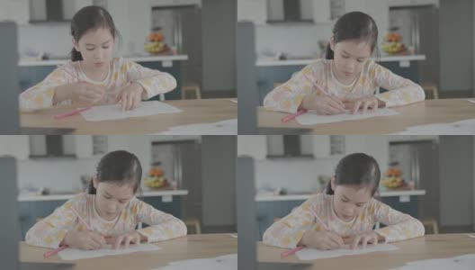 混合亚洲女孩在家里用笔记本电脑视频通话，使用缩放在线虚拟课堂，社交距离，在家上学，远程学习，新常态概念高清在线视频素材下载