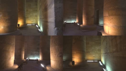 阿斯旺市附近的埃及图案和照明隧道的埃德夫神庙。埃及。飞机后面。在尼罗河河畔的Edfu城，希腊罗马建筑，献给荷鲁斯高清在线视频素材下载