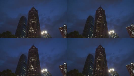 夜光照亮广州市区著名的摩天大楼全景，4k中国高清在线视频素材下载