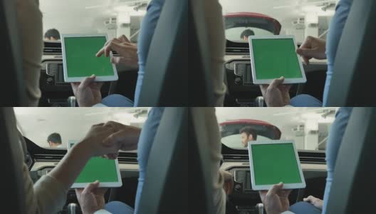 一男一女在车里用平板电脑高清在线视频素材下载