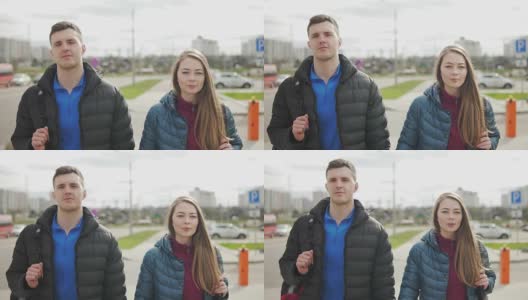 年轻的男男女女走在街上高清在线视频素材下载