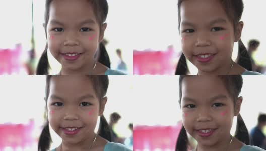 身体彩绘小女孩快乐肖像笑脸，慢动作高清在线视频素材下载