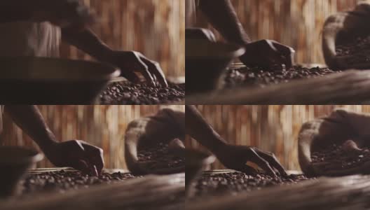 非洲工人正在分类咖啡豆高清在线视频素材下载