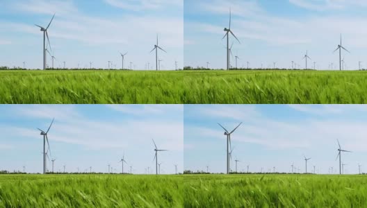 发电机组的风车在绿色的麦田里生产高清在线视频素材下载