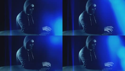 黑客入侵计算机键盘蓝色抽象背景高清在线视频素材下载