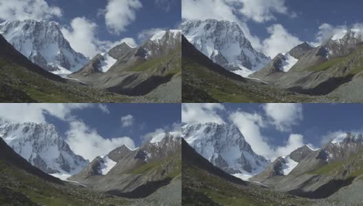 风景有雪山、云和蓝天。天山、吉尔吉斯斯坦高清在线视频素材下载