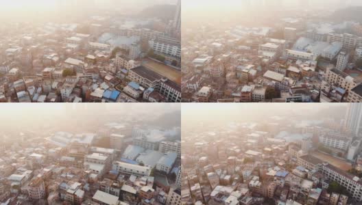 航拍视频拍摄。无人机在典型的中国地区上空飞行。太阳照耀高清在线视频素材下载