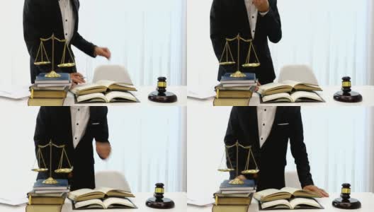 亚洲律师在律师办公室的桌子上准备文件。高清在线视频素材下载