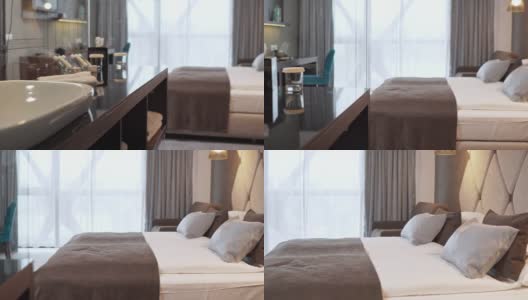 现代酒店房间里的新床单高清在线视频素材下载