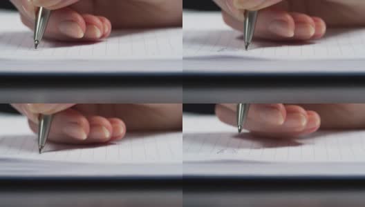 一张写在纸上的手的特写高清在线视频素材下载